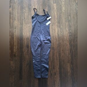 TNA Aritzia action onsie black adjustable active Jumpsuit sz S/P